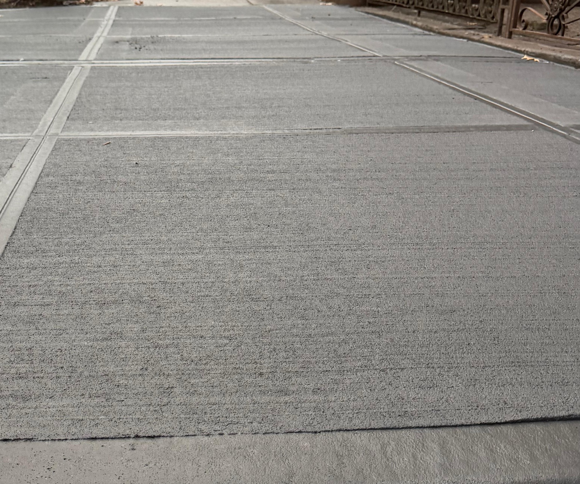 New sidewalk panels, broom finish and tooled joints