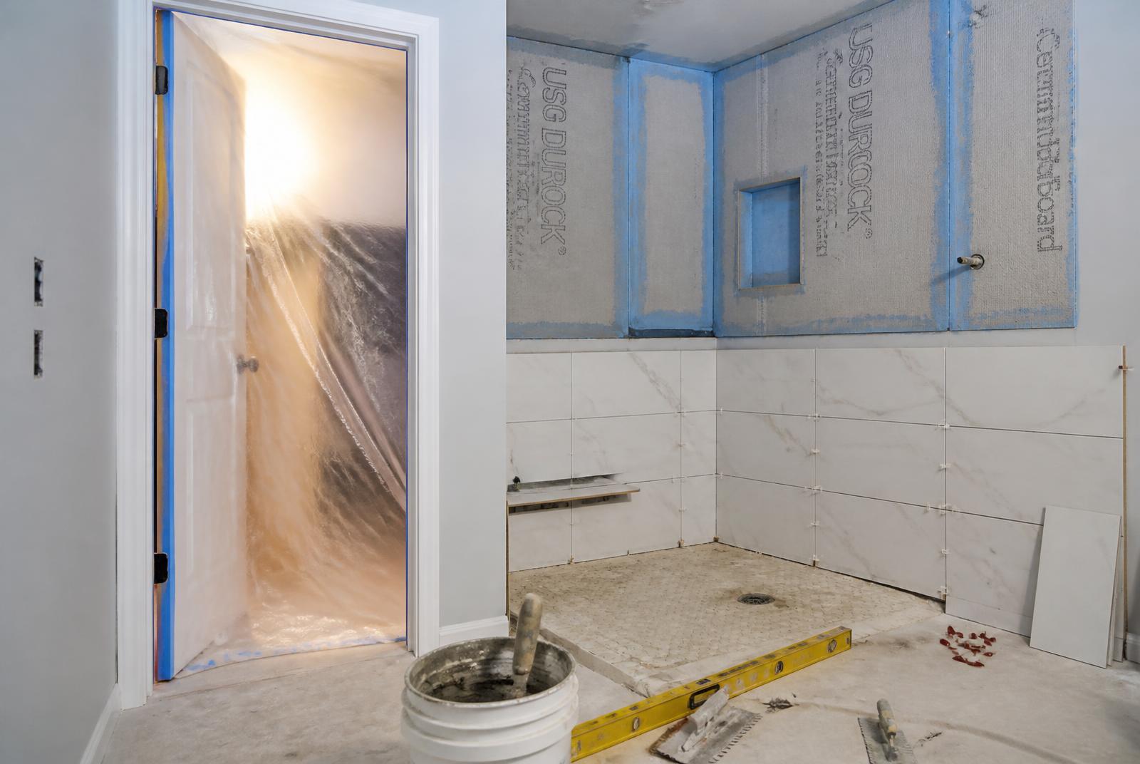 Cement board, waterproofing membrane and tile in progress